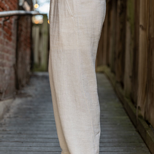 Hansen Garments Bobby Wide Pleated Trousers - Off White Gauze - model shot - waist down - side facing