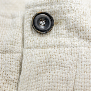 Hansen Garments Bobby Wide Pleated Trousers - Off White Gauze - product shot - detail shot of button - front facing