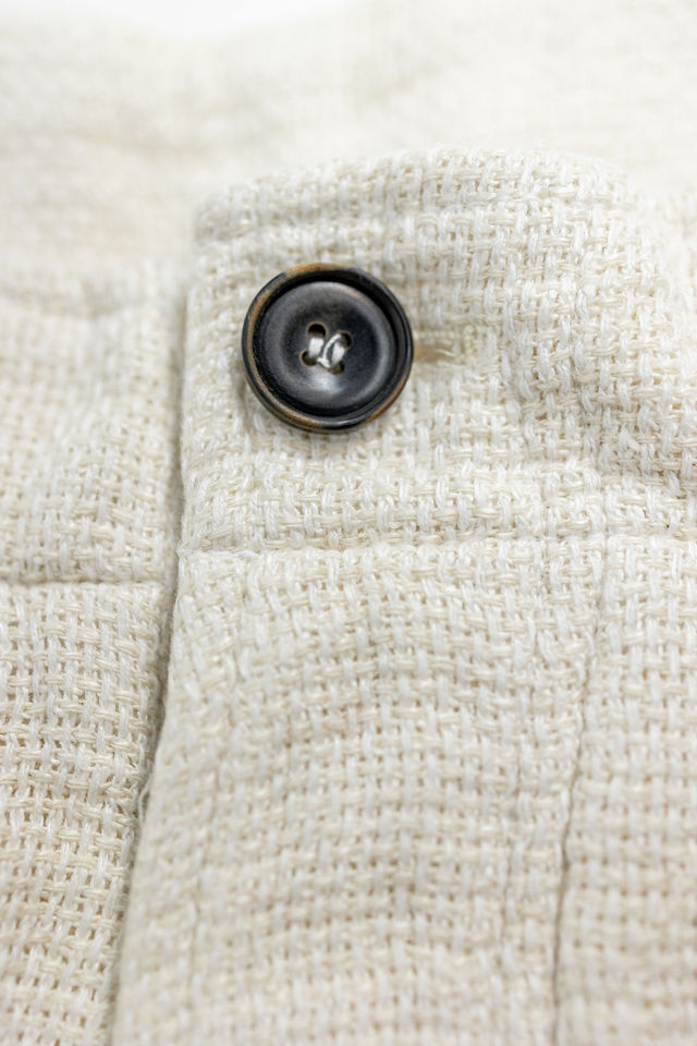 Hansen Garments Bobby Wide Pleated Trousers - Off White Gauze - product shot - detail shot of button - front facing