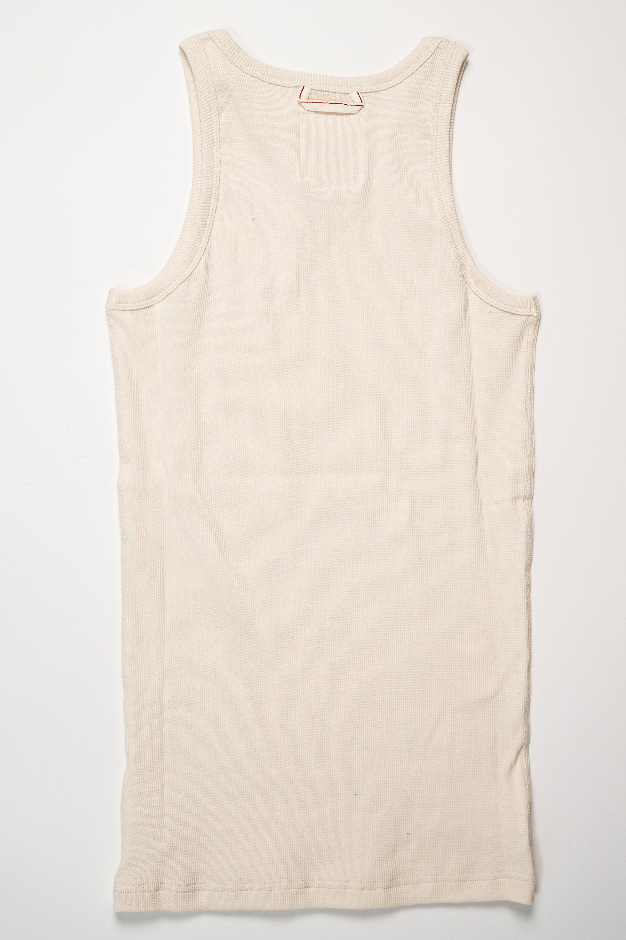 Hemen Biarritz Tank Top Gari - Stone. laid on face