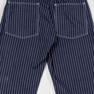 Navy striped fatigue pocket pants with cinch buckle rear, back view laying flat