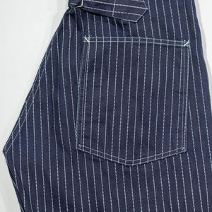 Navy striped fatigue pocket pants back pocket and cinch, folded laying flat