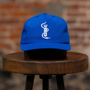 Franklin & Poe Surf Cap - Nylon Royal Blue on stool, facing forward