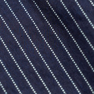 Navy striped fatigue pocket pants close up on fabric