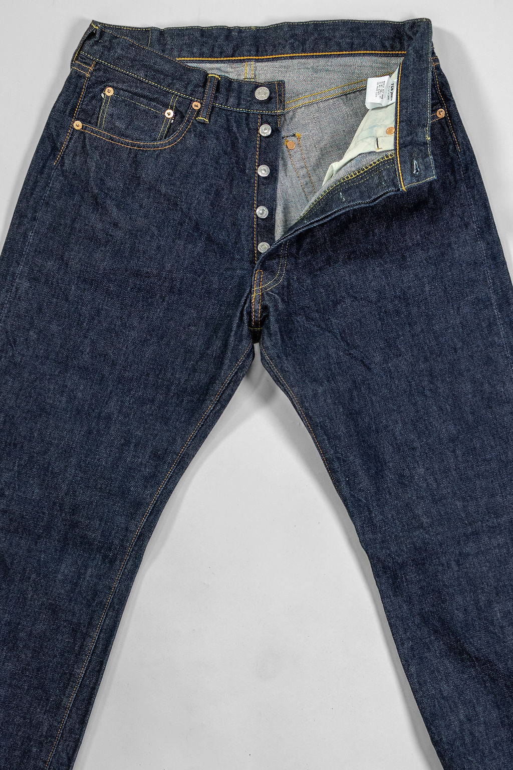 TCB Jeans 50's Jeans - 13.50z Denim One Wash. laid on back buttons undone