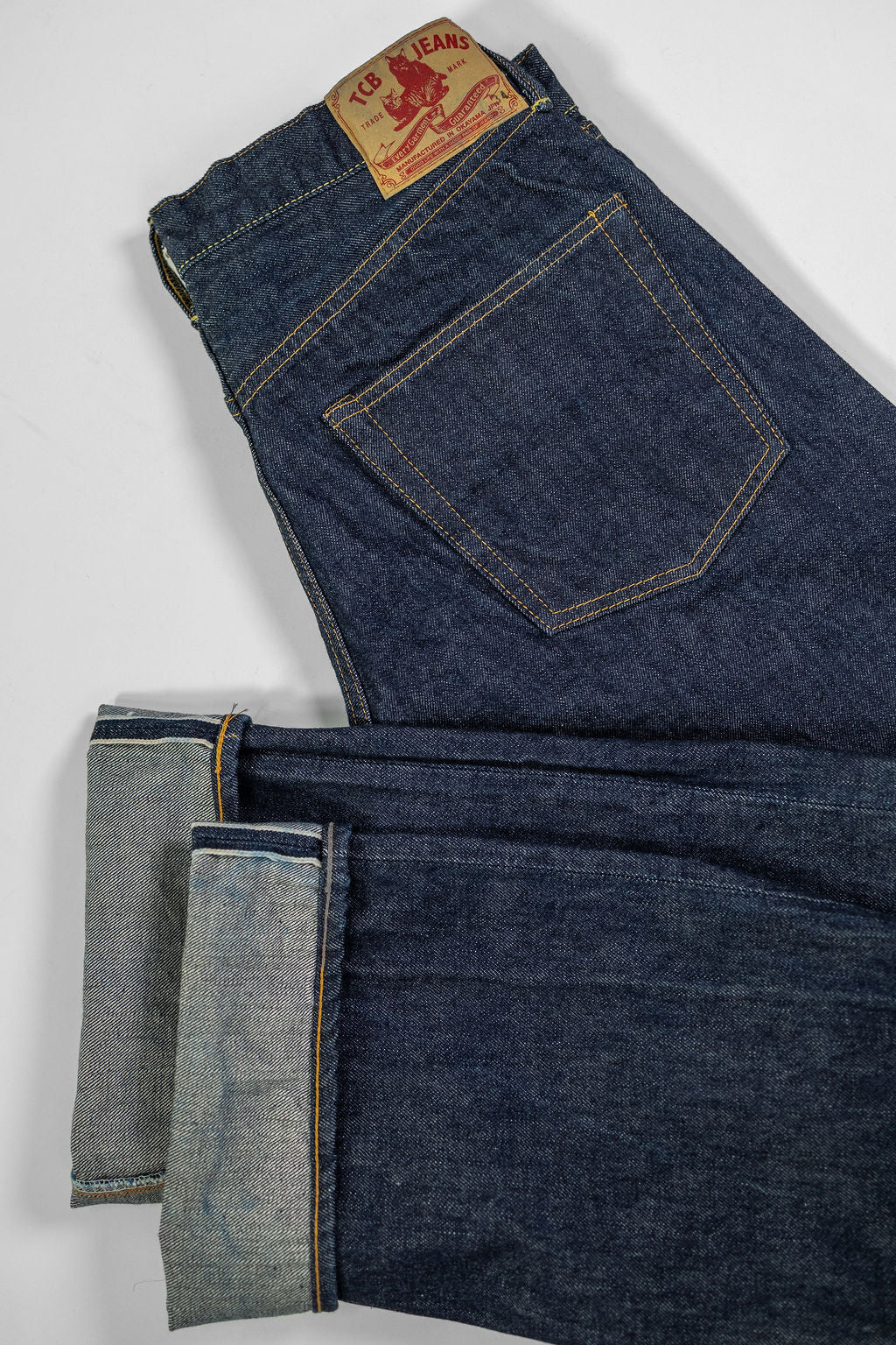 TCB Jeans 50's Jeans - 13.50z Denim One Wash. laid flat with cuff showing