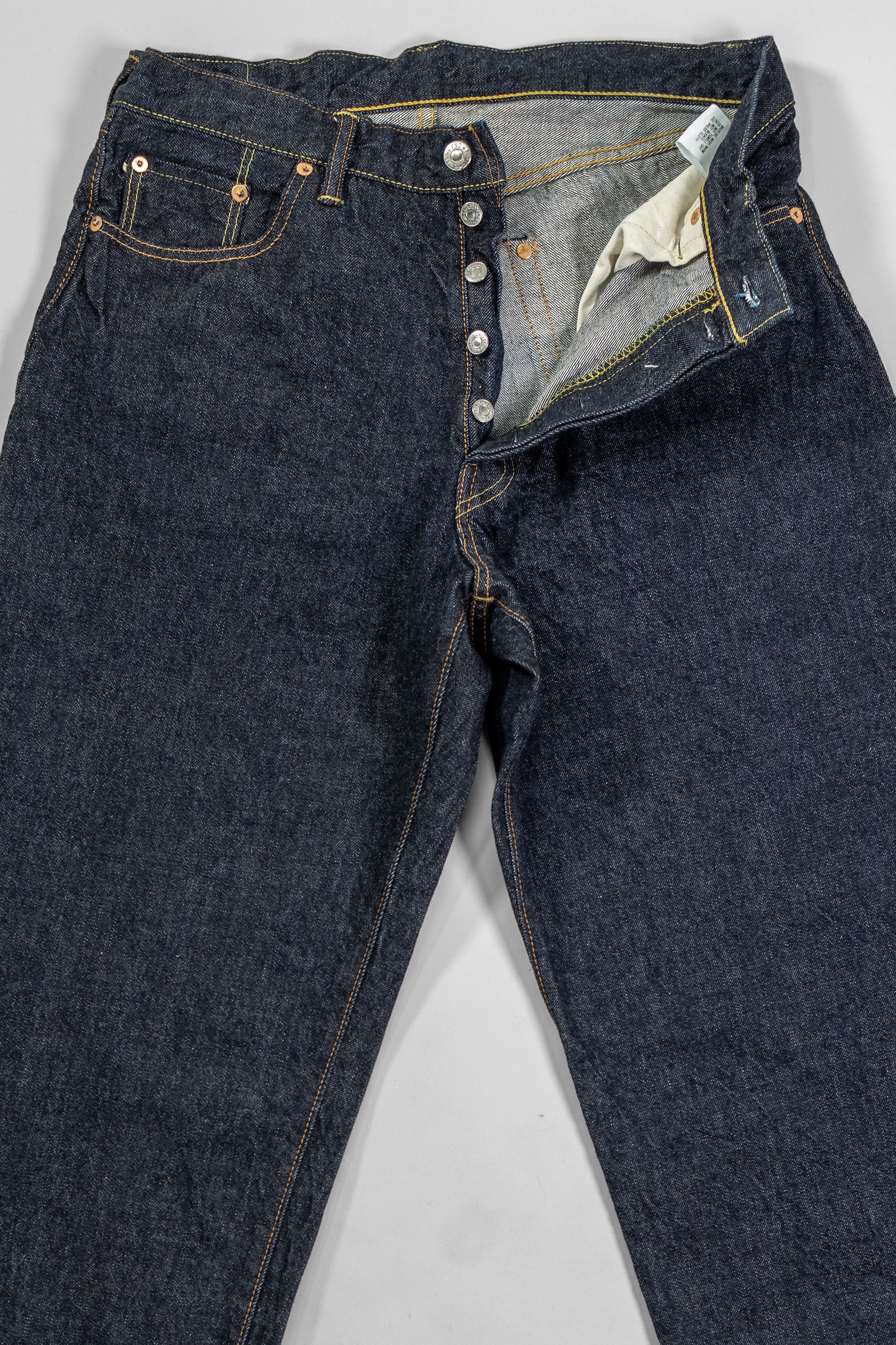 TCB Jeans Baggy 50's Jeans - 13.5oz Denim One Wash. laid on back with front buttons undone