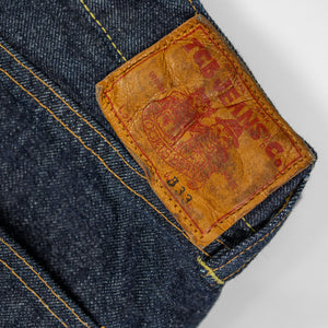 TCB Jeans Baggy 50's Jeans - 13.5oz Denim One Wash. close up of leather patch