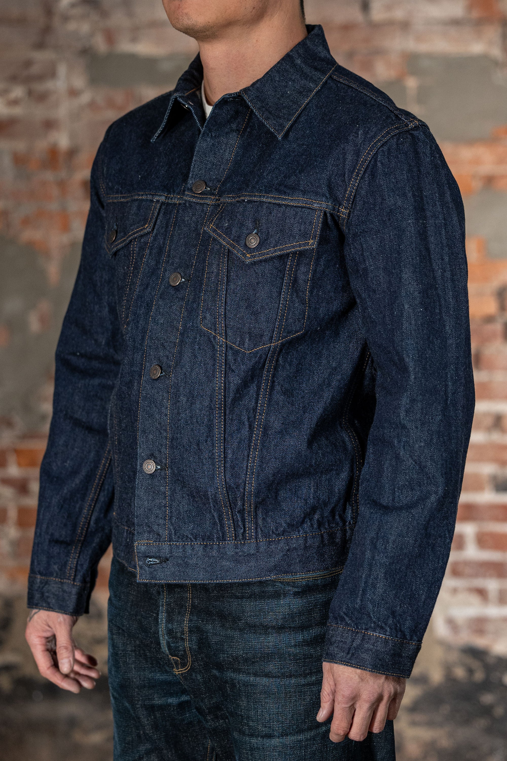 TCB Jeans 60's Trucker Jacket - One-Wash. on model side profile