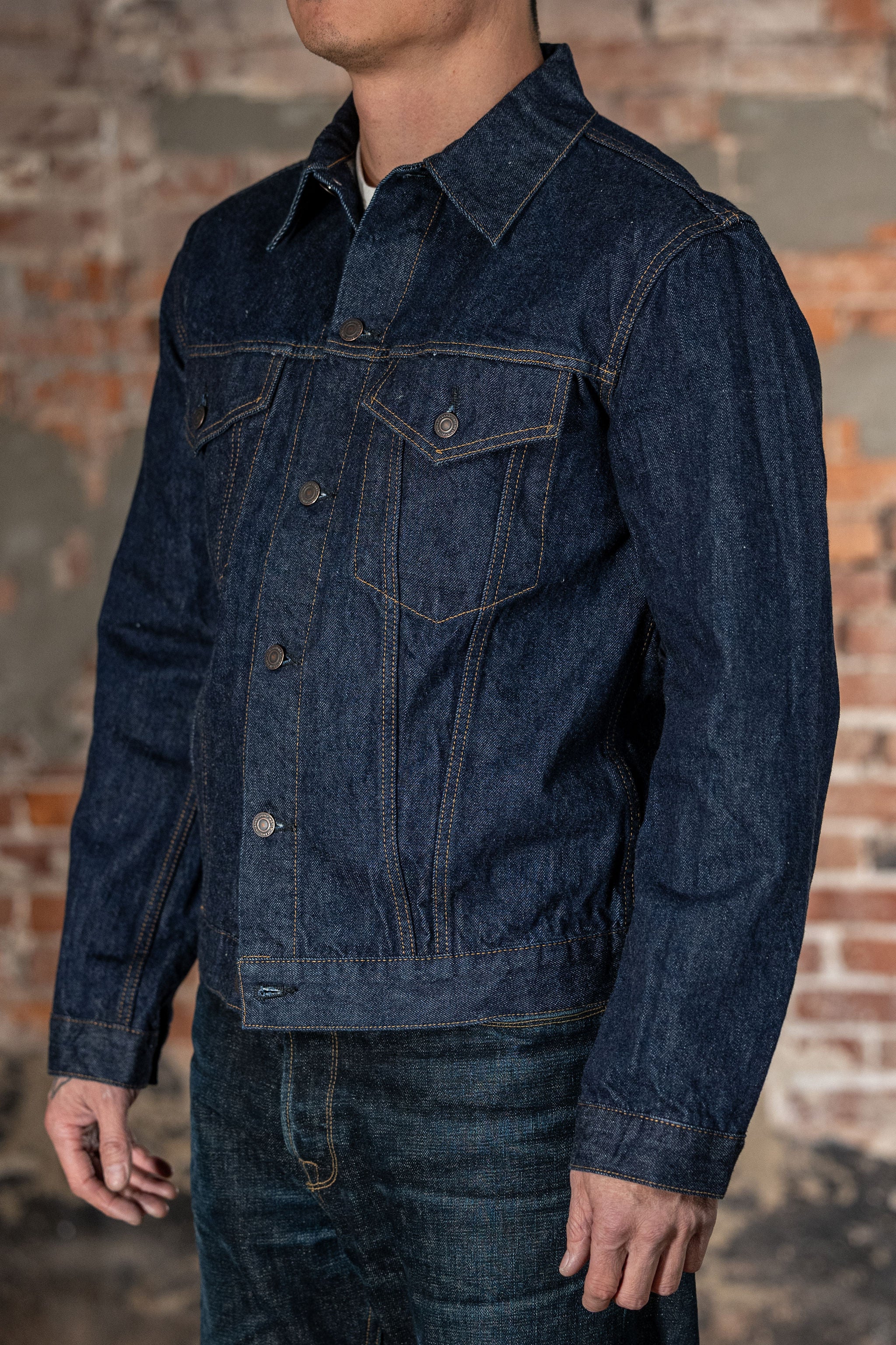 TCB Jeans 60's Trucker Jacket - One-Wash. on model side profile