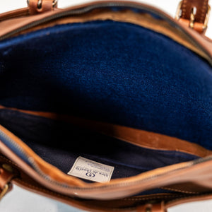 Bleu de Chauffe Folder Business Bag - Amber Brown. detail shot of bag lining 