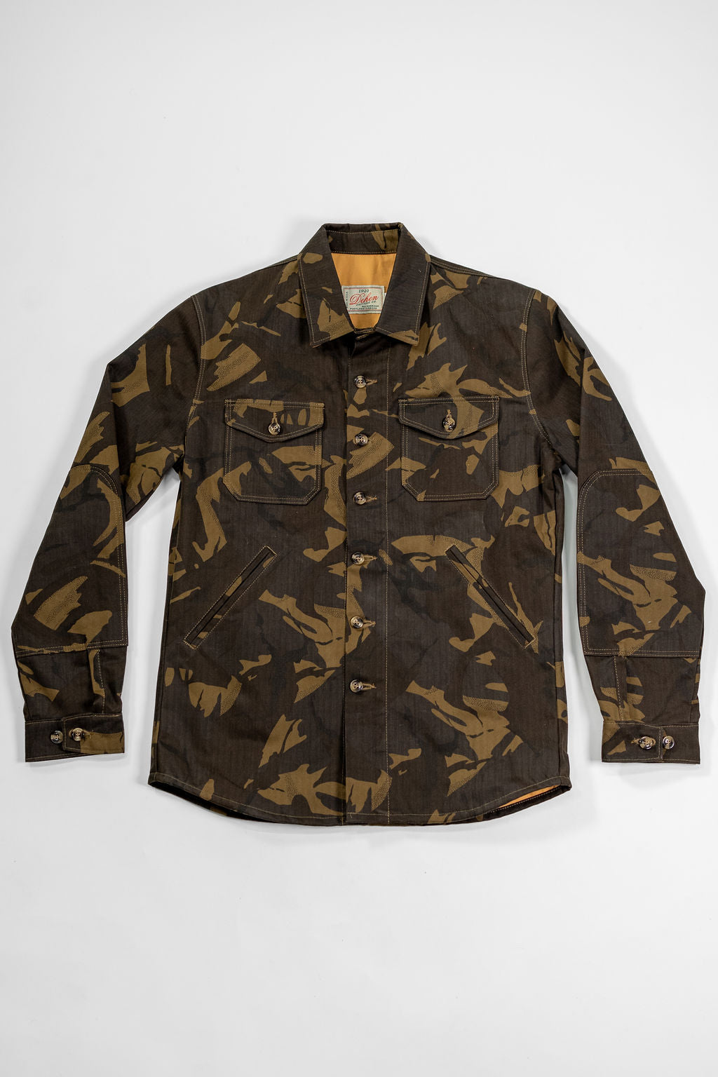 Dehen 1920 Waxed Cotton Crissman - Darkwood Camo Dry Waxed Cotton. laid on back