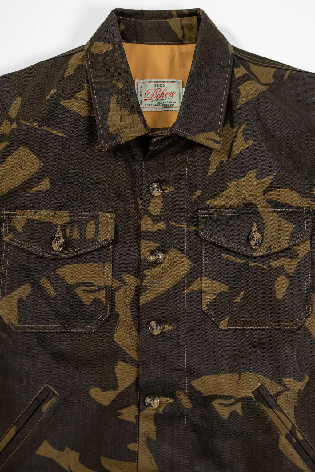 Dehen 1920 Waxed Cotton Crissman - Darkwood Camo Dry Waxed Cotton. close up of front button detail