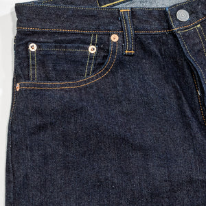 Indigo denim jeans wide cut front view laying flat close up