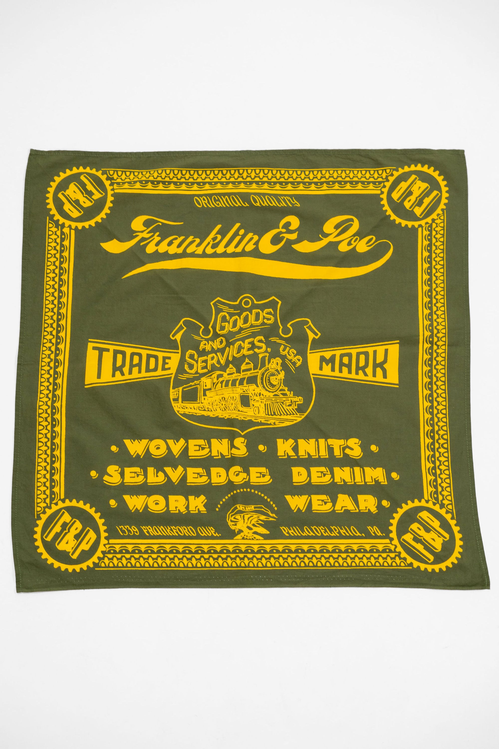 Green bandana with custom yellow design and text