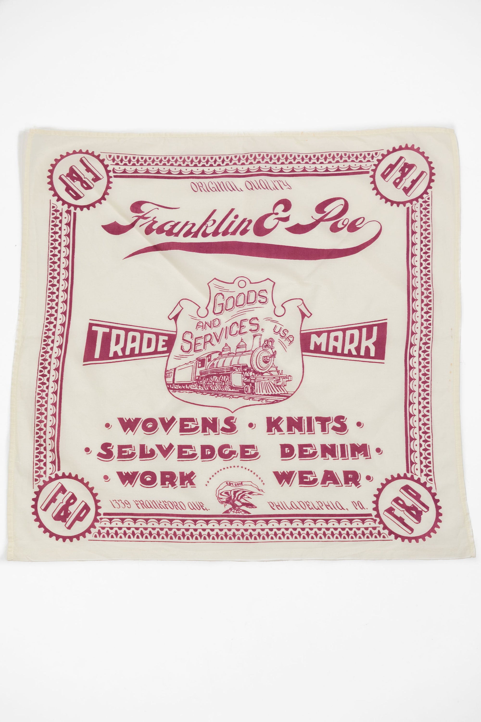 Natural color bandana with custom dark red design and text