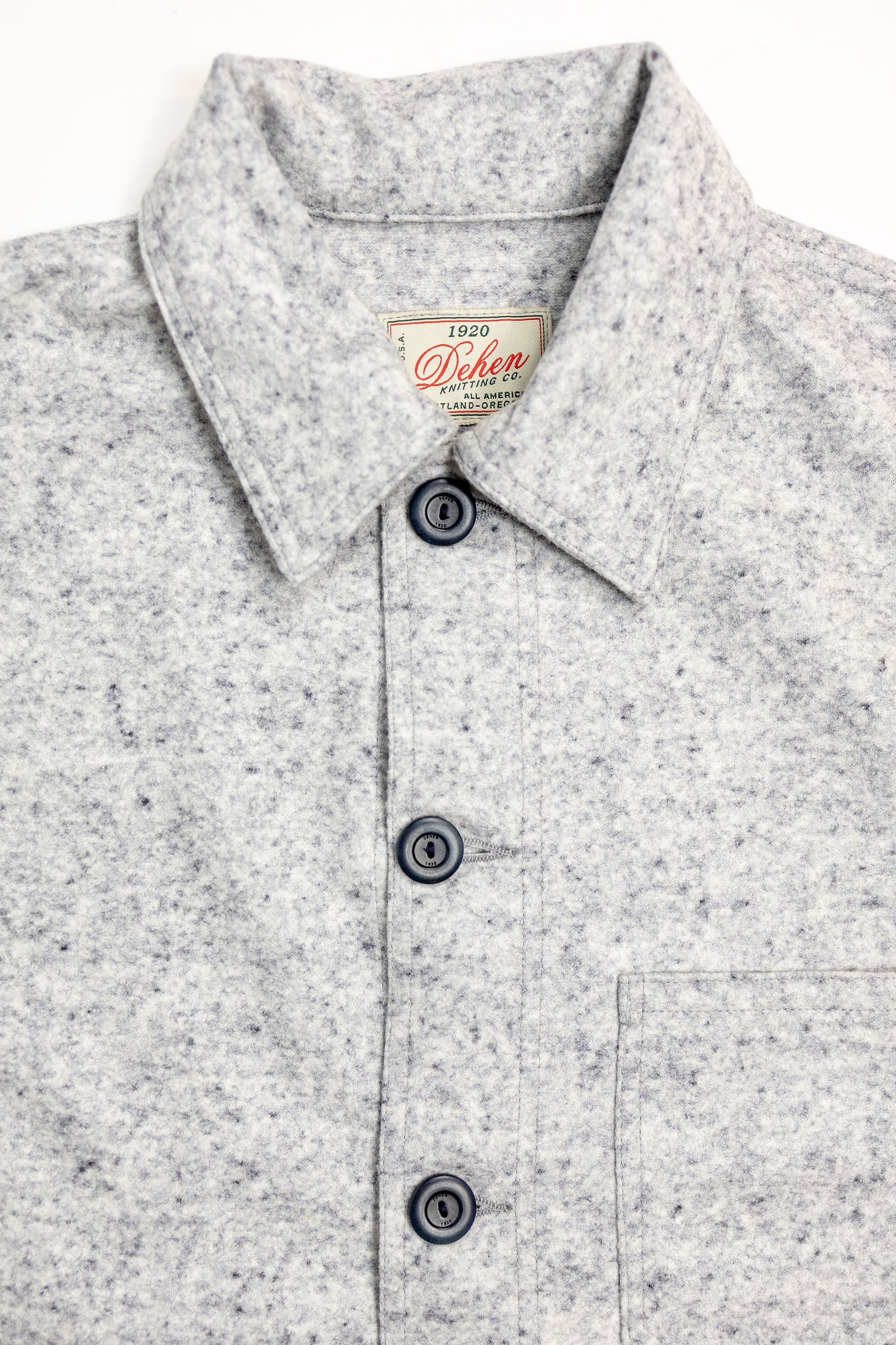 Dehen 1920 Chore Coat - Natural & Navy Heather Wool. close up of front button detail