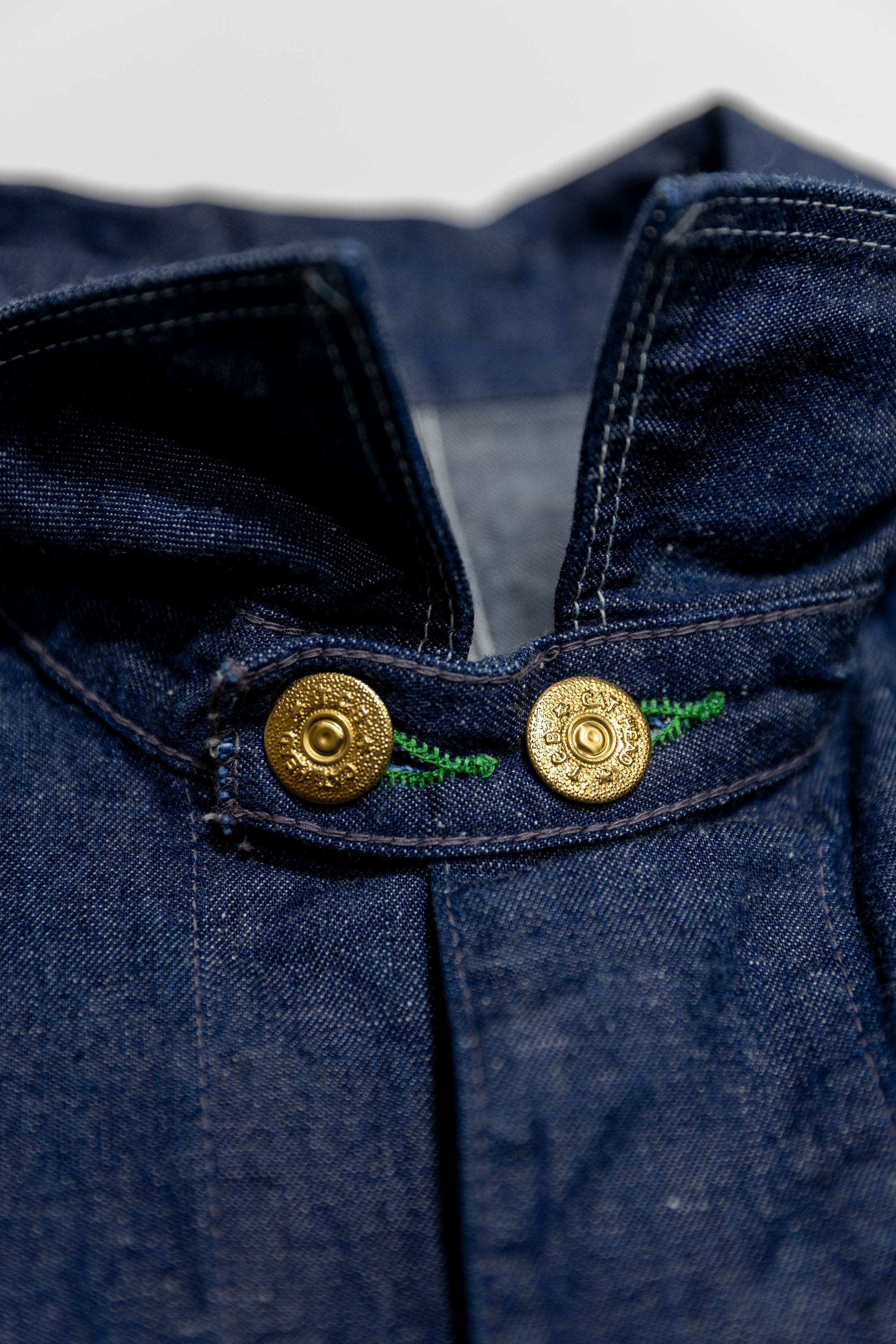 TCB Jeans Cat Head Jacket - Indigo Denim. close up of front collar buttons