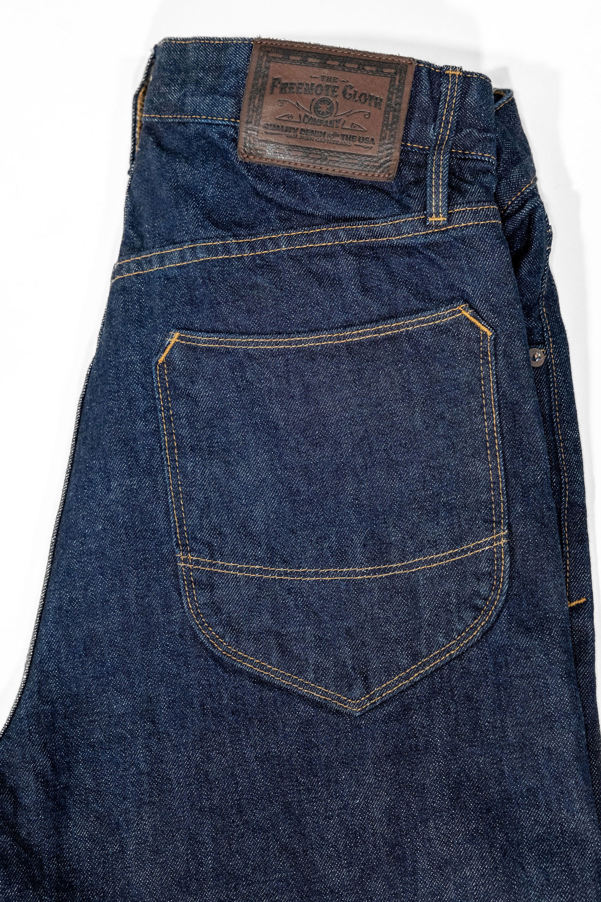 Freenote Cloth Modesto - 14oz 50's Denim Rinsed. laid on side with back pocket showing