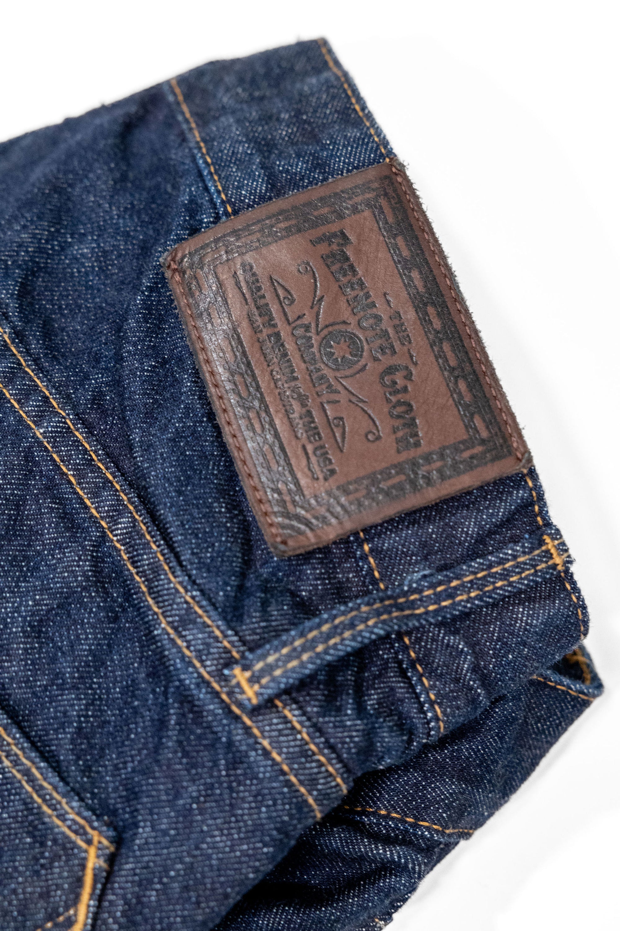 Freenote Cloth Modesto - 14oz 50's Denim Rinsed. close up detail shot of back leather patch