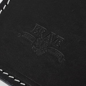 Obbi Good Label Brave Horsehide Condor Mid Wallet - Black - Detail of embossed logo on inside of wallet