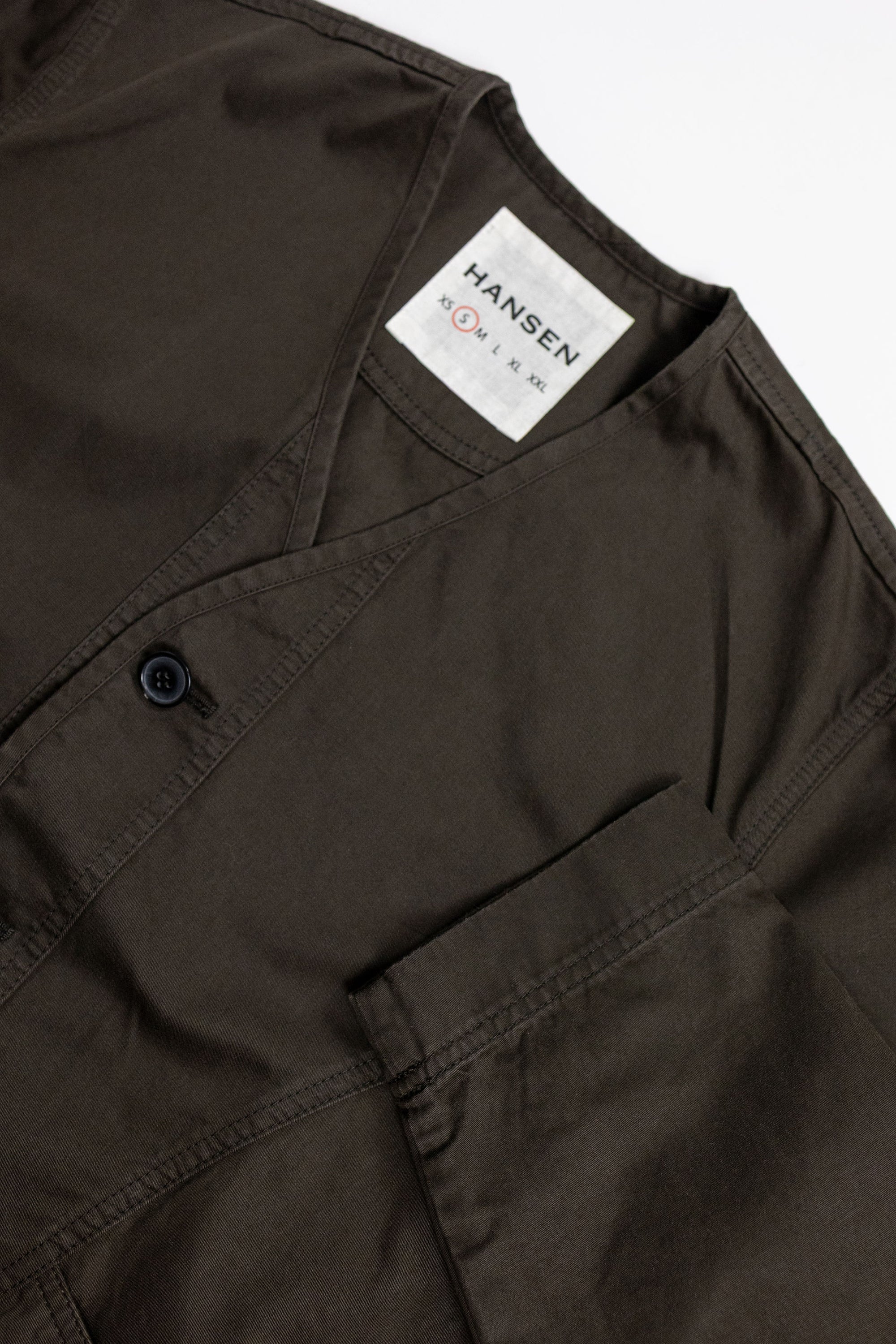 Hansen Garments Bernard Flight Jacket - Coffee Drill - product shot - white background - close up on collar, sleeve, and button