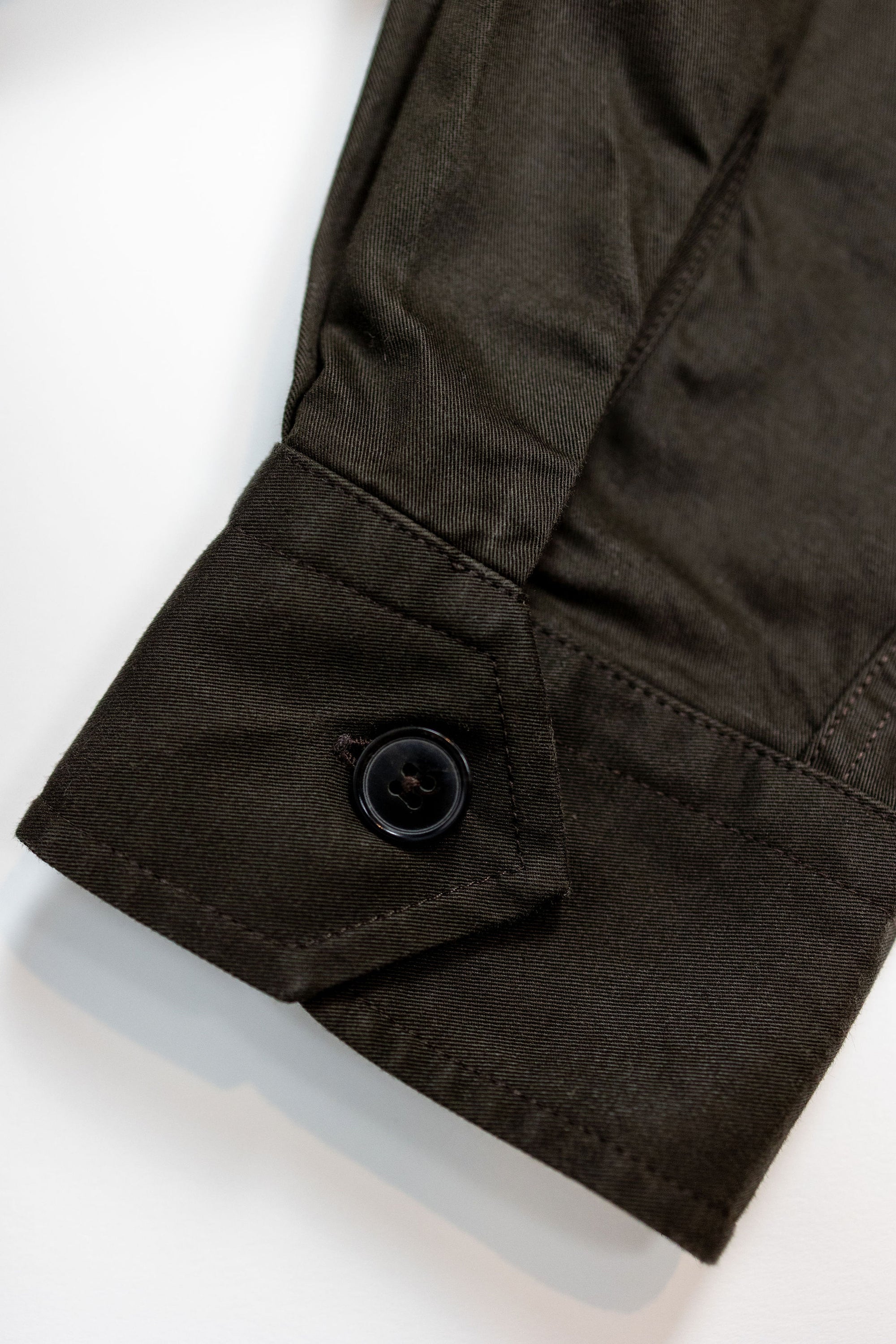 Hansen Garments Steffen Shirt Jacket - Coffee Drill - product shot - front facing - white background - detail shot of sleeve button- white background