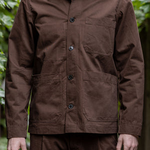 Hansen Garments Bendik Workwear Jacket - Chestnut - model shot - front facing - outside foliage background