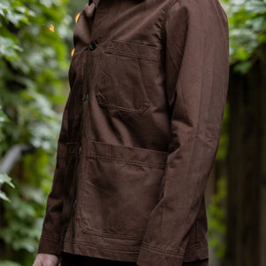Hansen Garments Bendik Workwear Jacket - Chestnut - model shot - side facing - outside foliage background