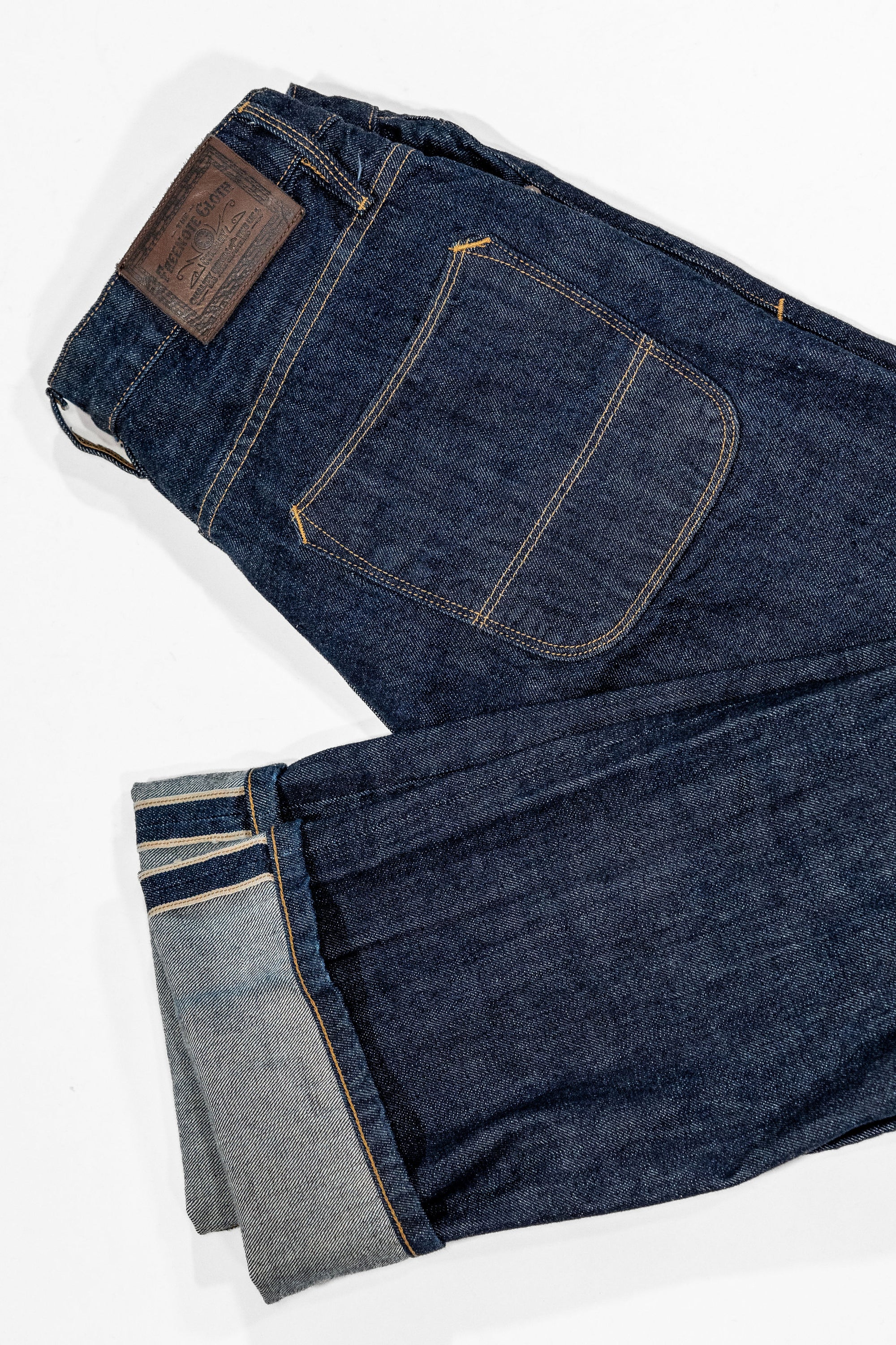 Freenote Cloth Belford - 14oz 50's Denim Rinsed. laid on side with cuff showing