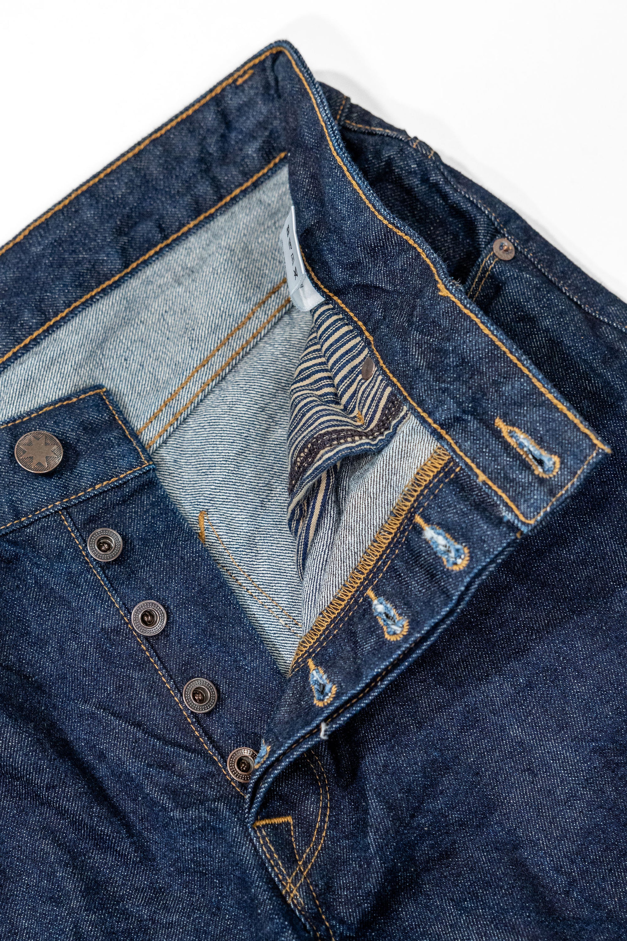 Freenote Cloth Belford - 14oz 50's Denim Rinsed. close up shot of open button fly details