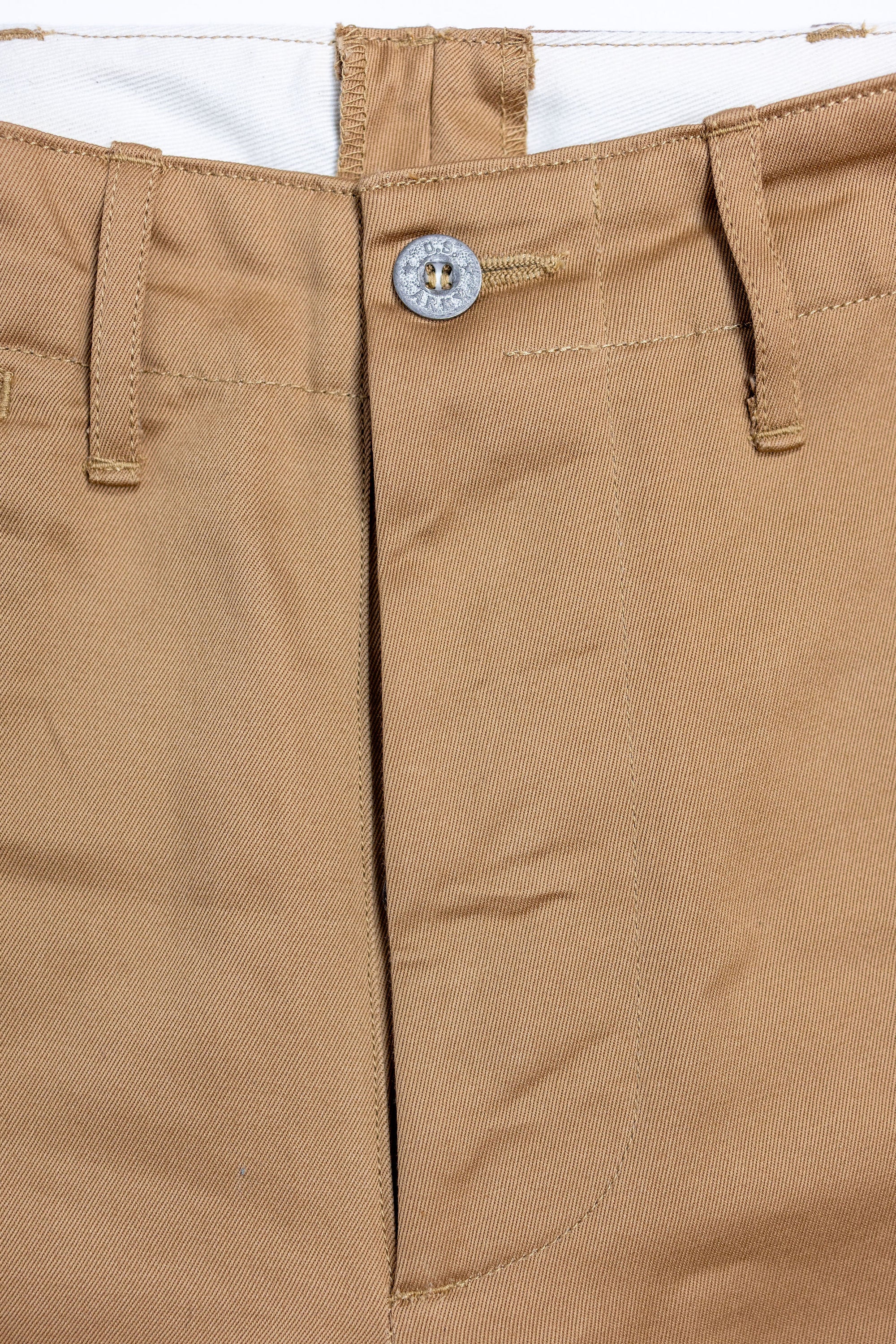 Buzz Rickson's M43035 Early Military Chinos 1945 Model in Camel - Laying flat, front view close-up