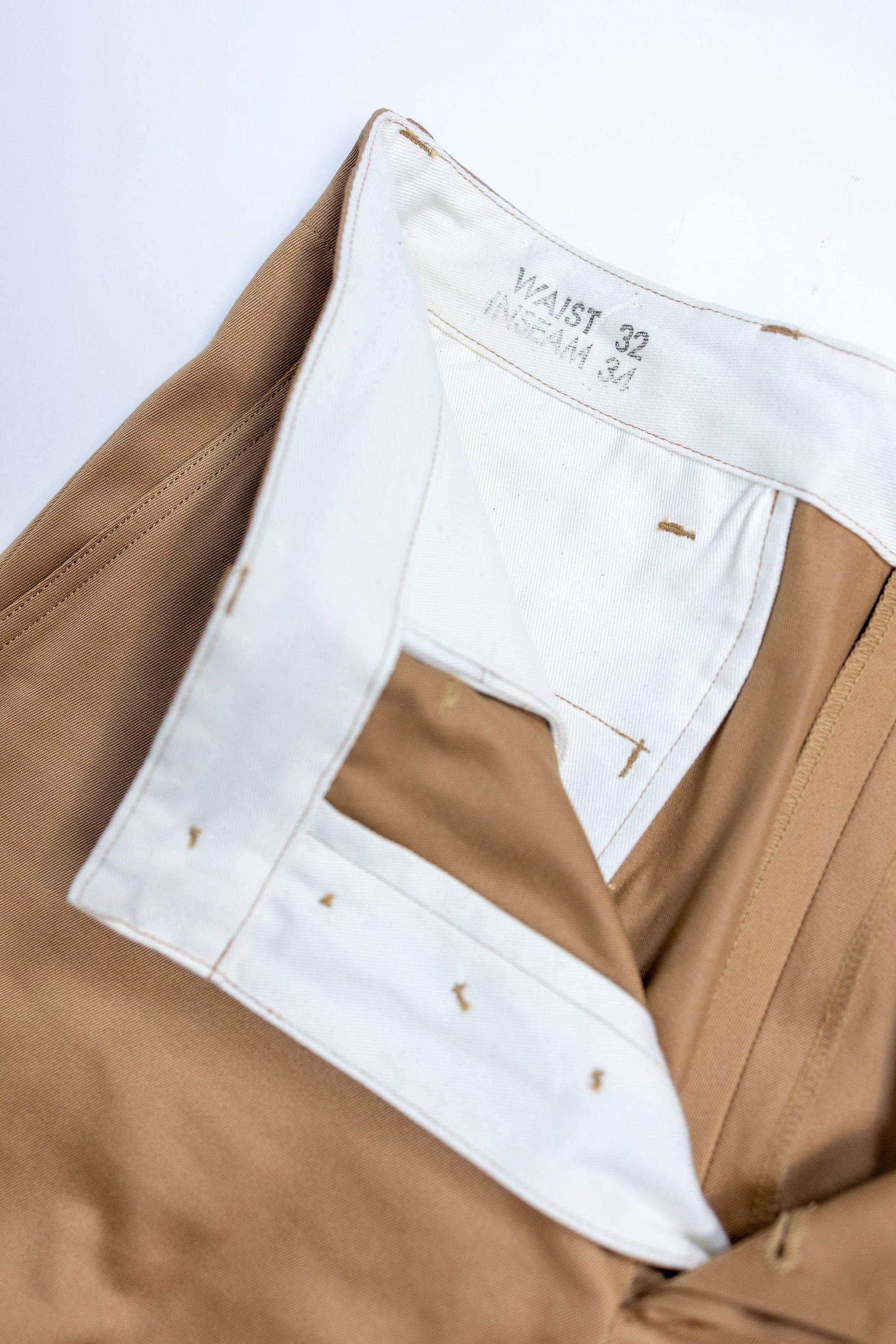Buzz Rickson's M43035 Early Military Chinos 1945 Model in Camel - Laying flat, close-up on inner waistband