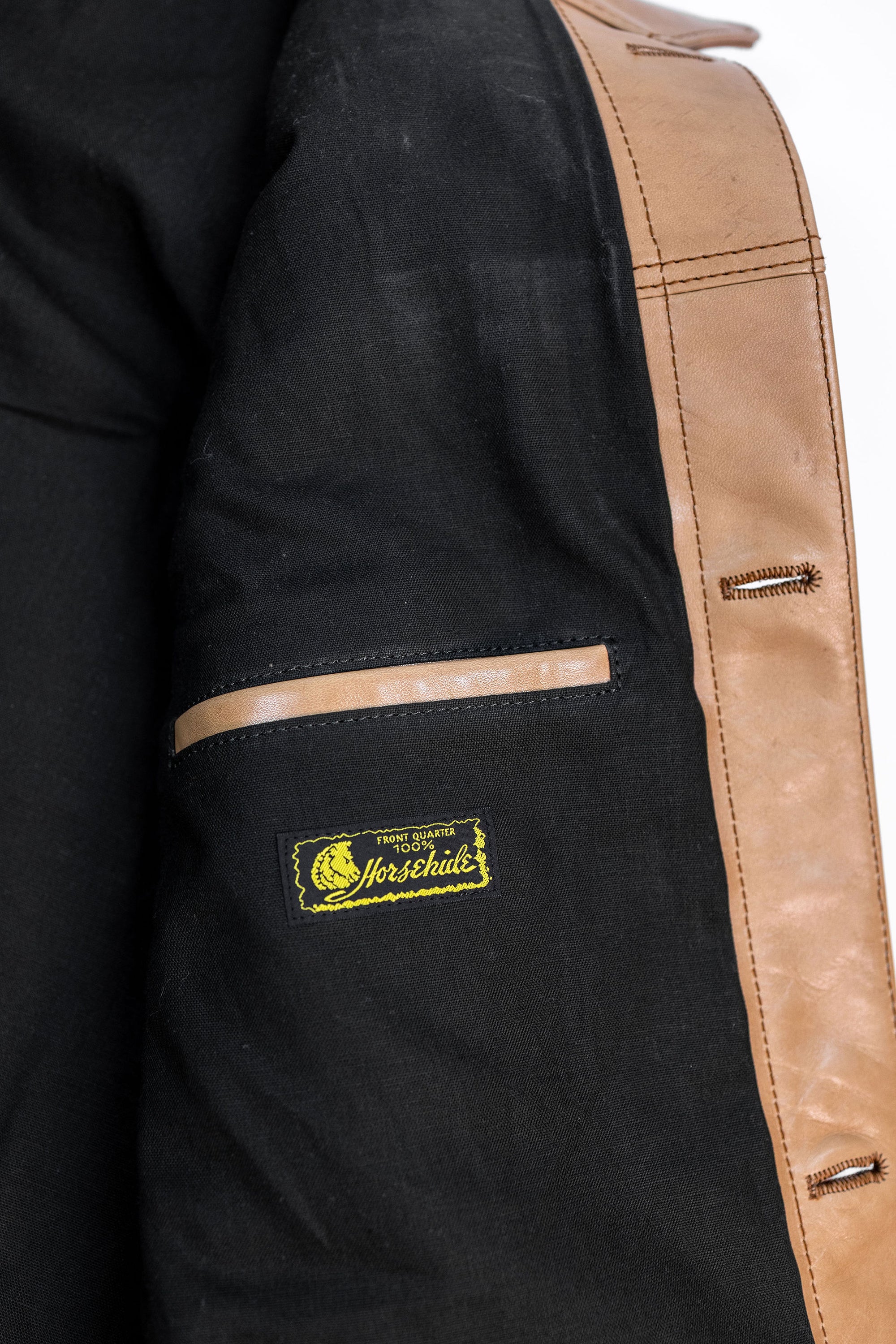 Y'2 persimmon Dyed Leather Jacket- detail of lining and tag