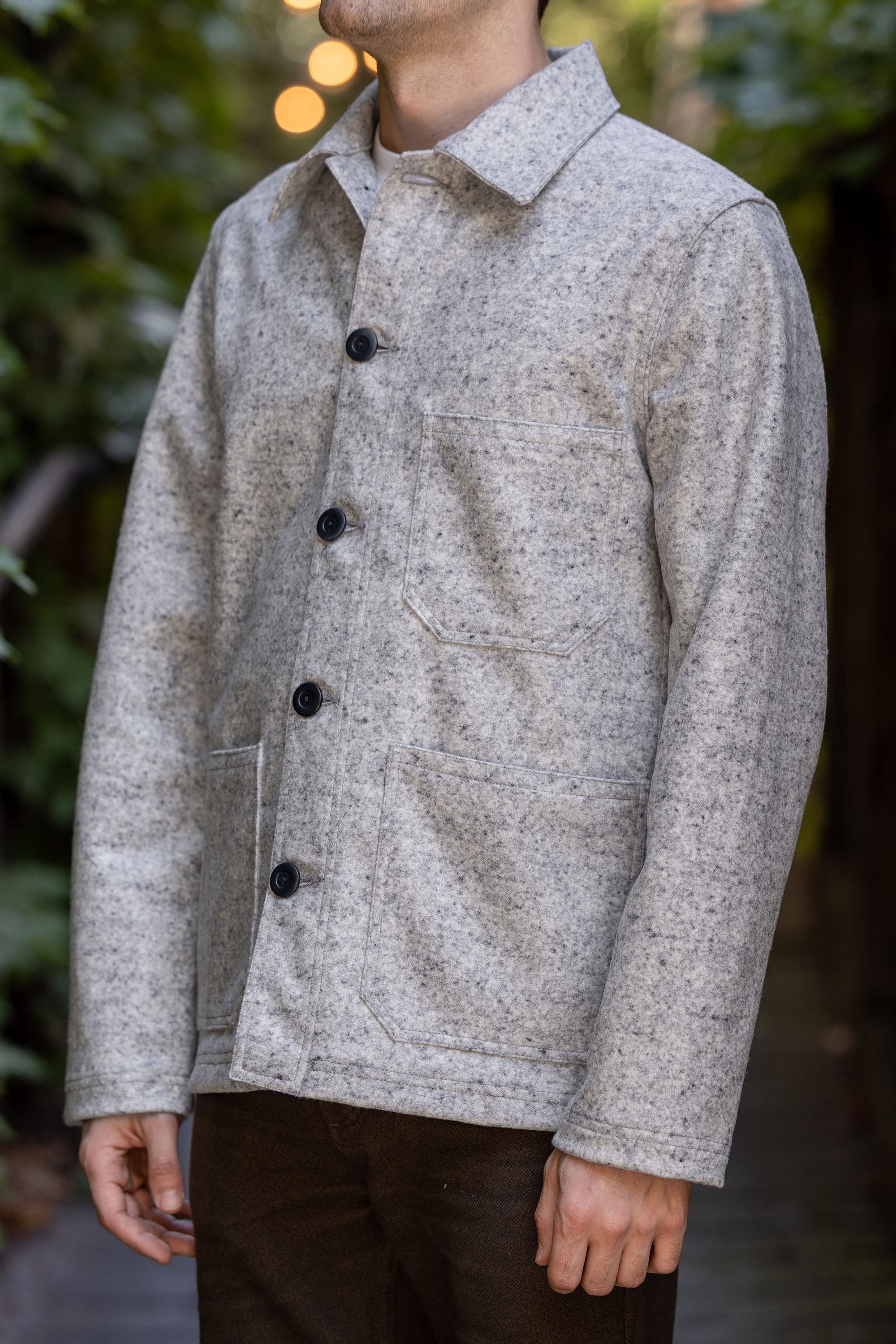 Dehen 1920 Chore Coat - Natural & Navy Heather Wool. on model side profile