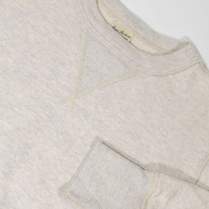 Buzz Rickson's BR65622 Set-in Crew Neck Sweatshirt in Oatmeal - Laying flat, front view close-up with sleeve cuff