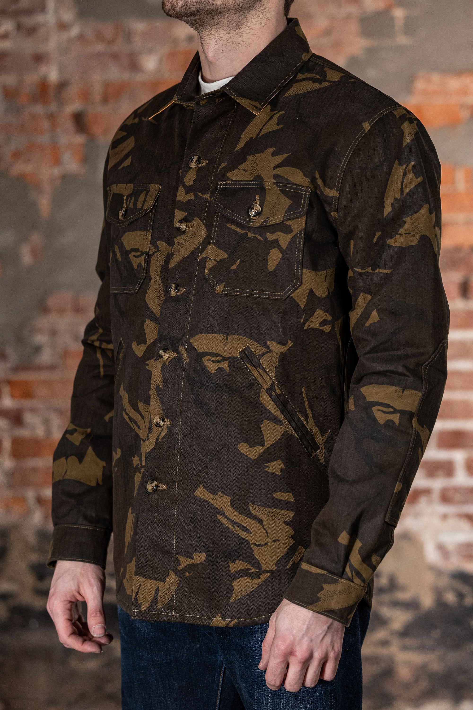 Dehen 1920 Waxed Cotton Crissman - Darkwood Camo Dry Waxed Cotton. on model side profile