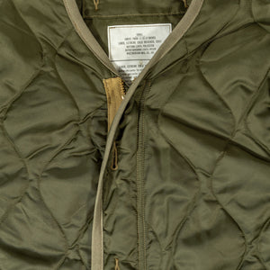 Buzz Rickson's BR15754 Type M-65 Liner in Olive - Laying flat, facing front close-up