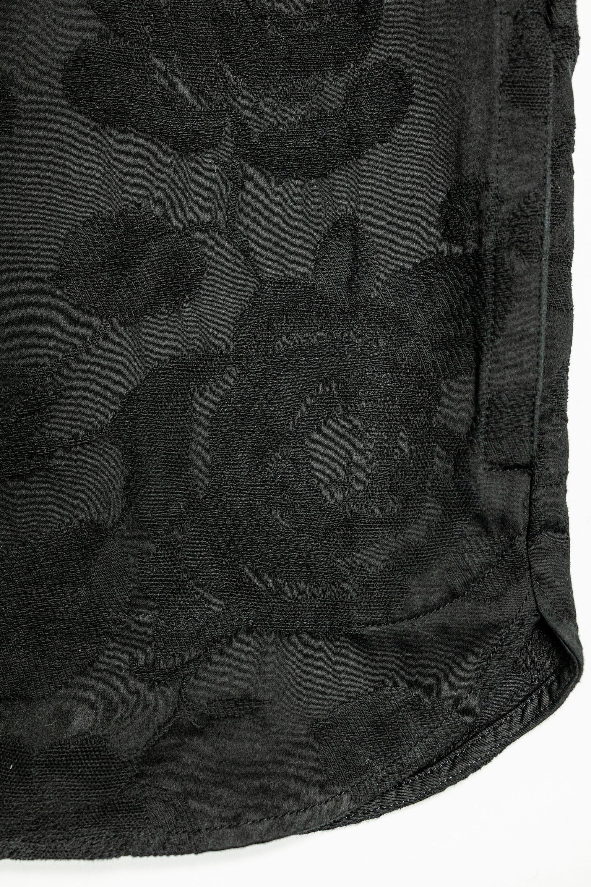 Hansen Garments Roman Loose Cut Jacket - Black Flowers - product shot - front facing - close up -  detail of fabric and bottom of jacket - white background