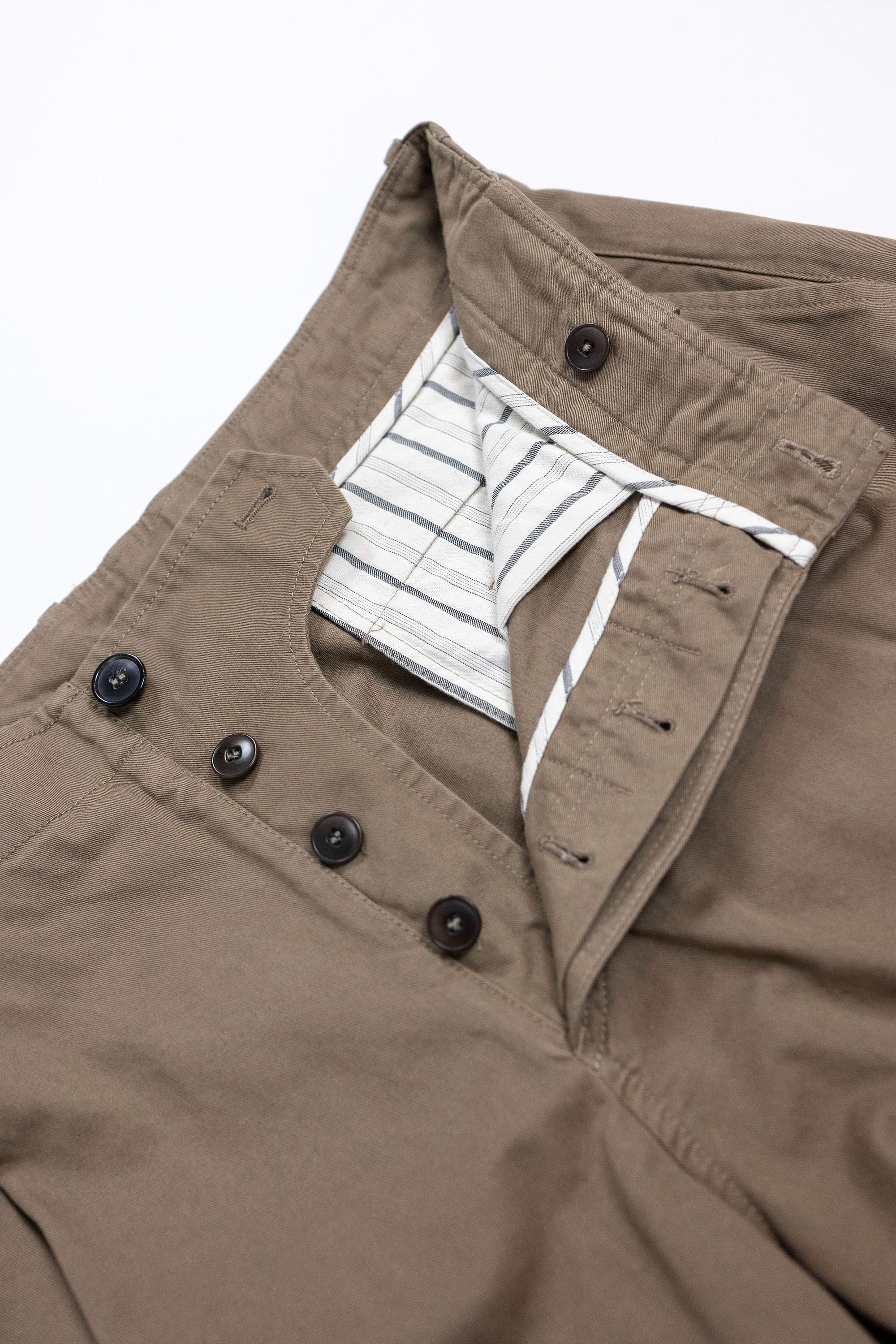 Hansen Garments Bobby Wide Pleated Trousers - Beige - product shot - front facing - white background - pants open - detail of buttons and interior