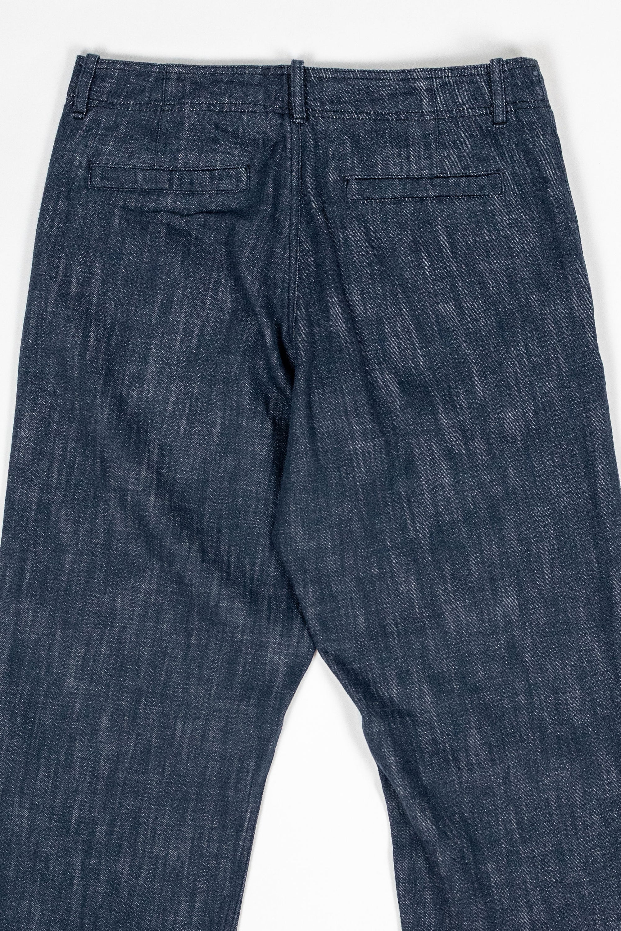 Hansen Garments Trygve Wide Cut Cropped Trousers - Denim Blue - product shot - back facing - white background - back pocket & waist - close up - detail