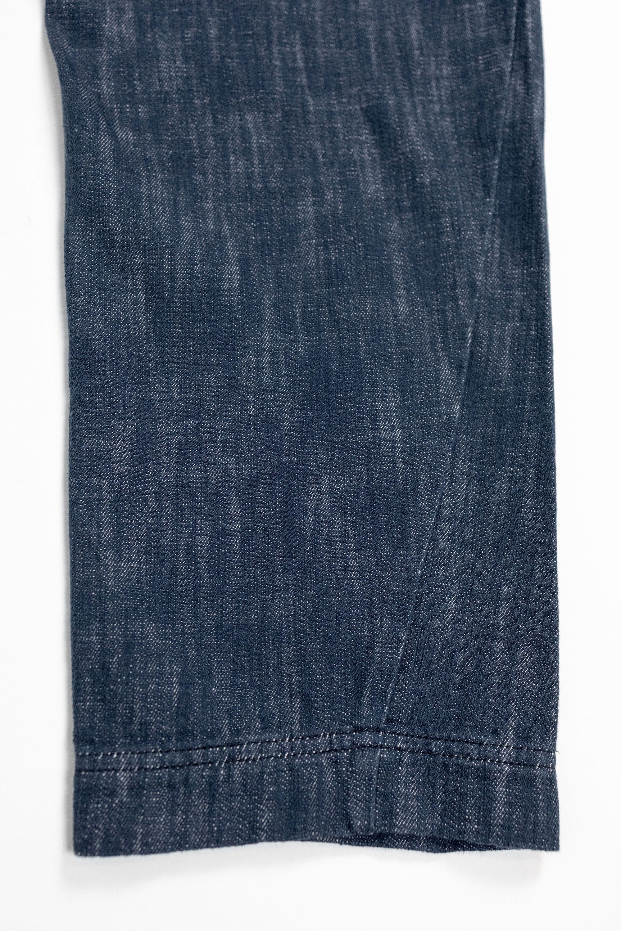 Hansen Garments Trygve Wide Cut Cropped Trousers - Denim Blue - product shot - white background - pants leg - close up - detail