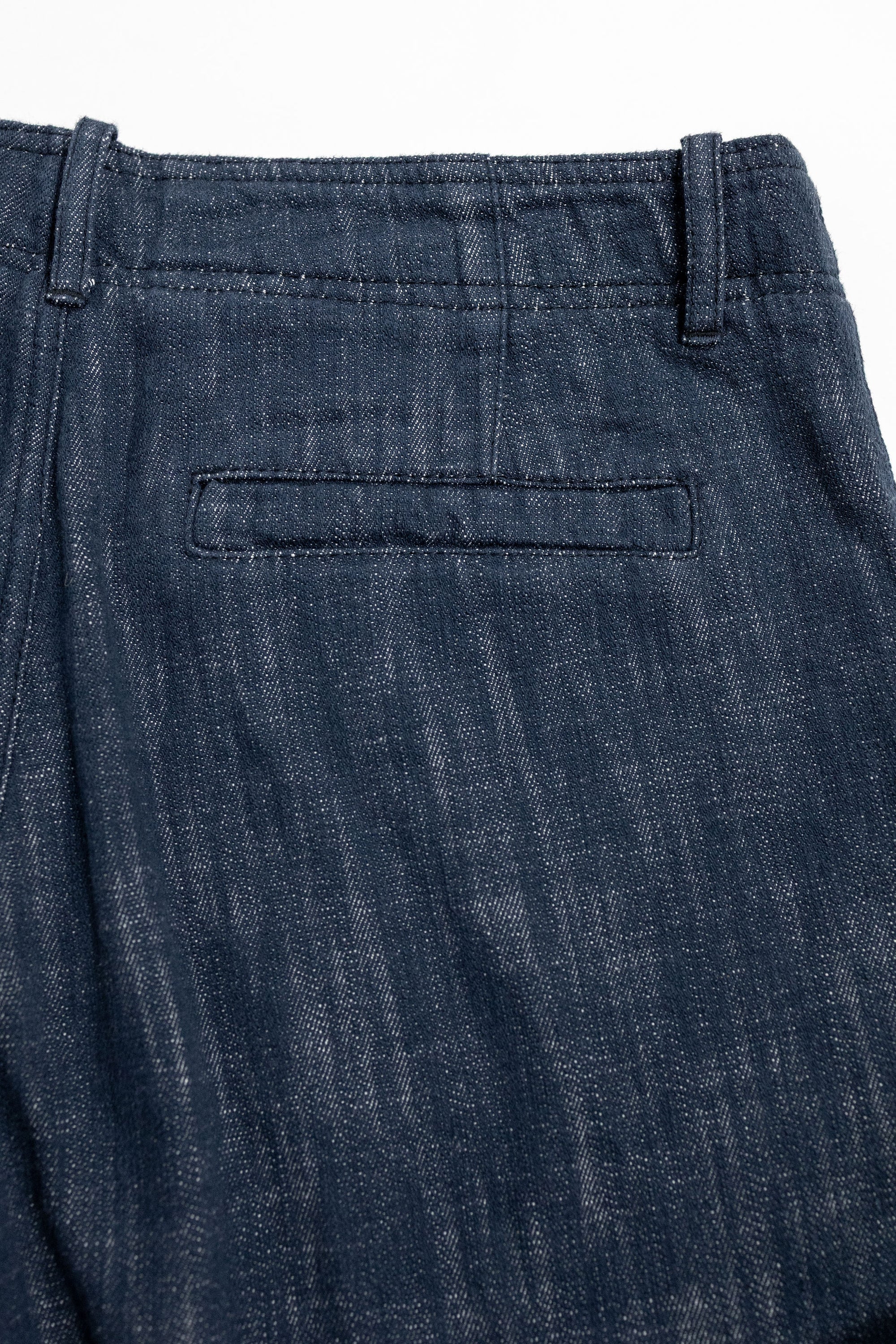 Hansen Garments Trygve Wide Cut Cropped Trousers - Denim Blue - product shot - back facing - white background - back pocket & waist - close up - detail