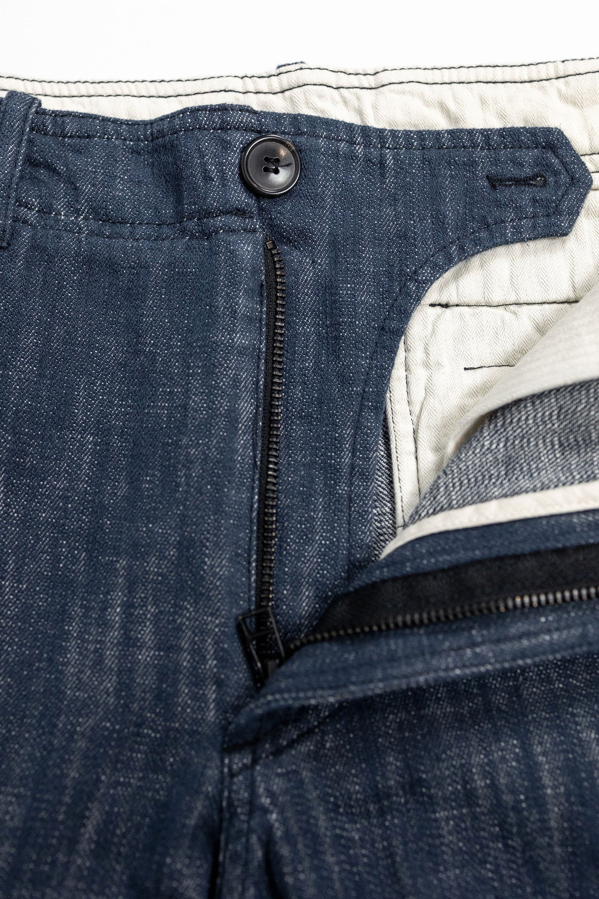 Hansen Garments Trygve Wide Cut Cropped Trousers - Denim Blue - product shot - front facing - white background - pants zipped open - close up