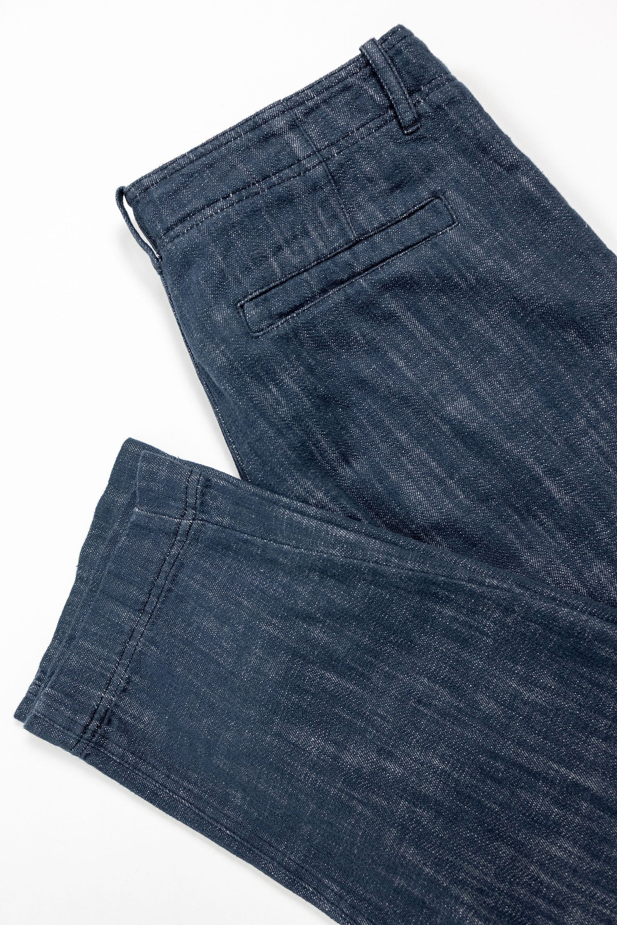 Hansen Garments Trygve Wide Cut Cropped Trousers - Denim Blue - product shot - white background - pants leg and back pocket - close up - detail