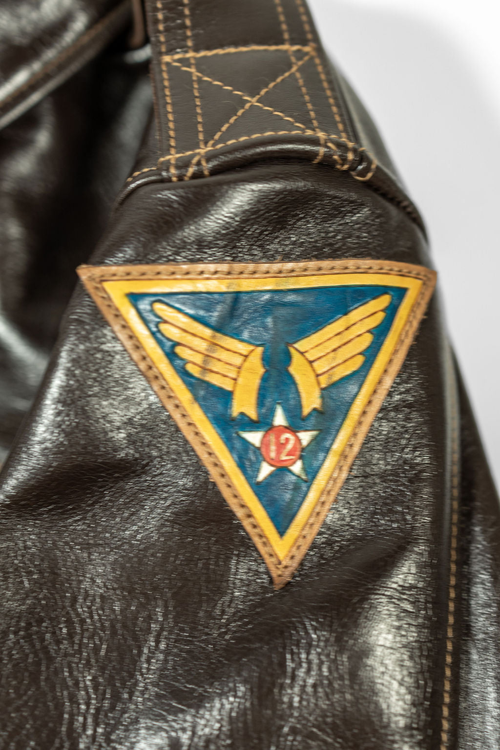 Buzz Rickson's BR80669 Type A-2 - Tight close-up on sleeve military insignia patch