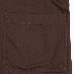 Hansen Garments Bendik Workwear Jacket - Chestnut - product shot - front facing - white background - close up detail of bottom pocket.