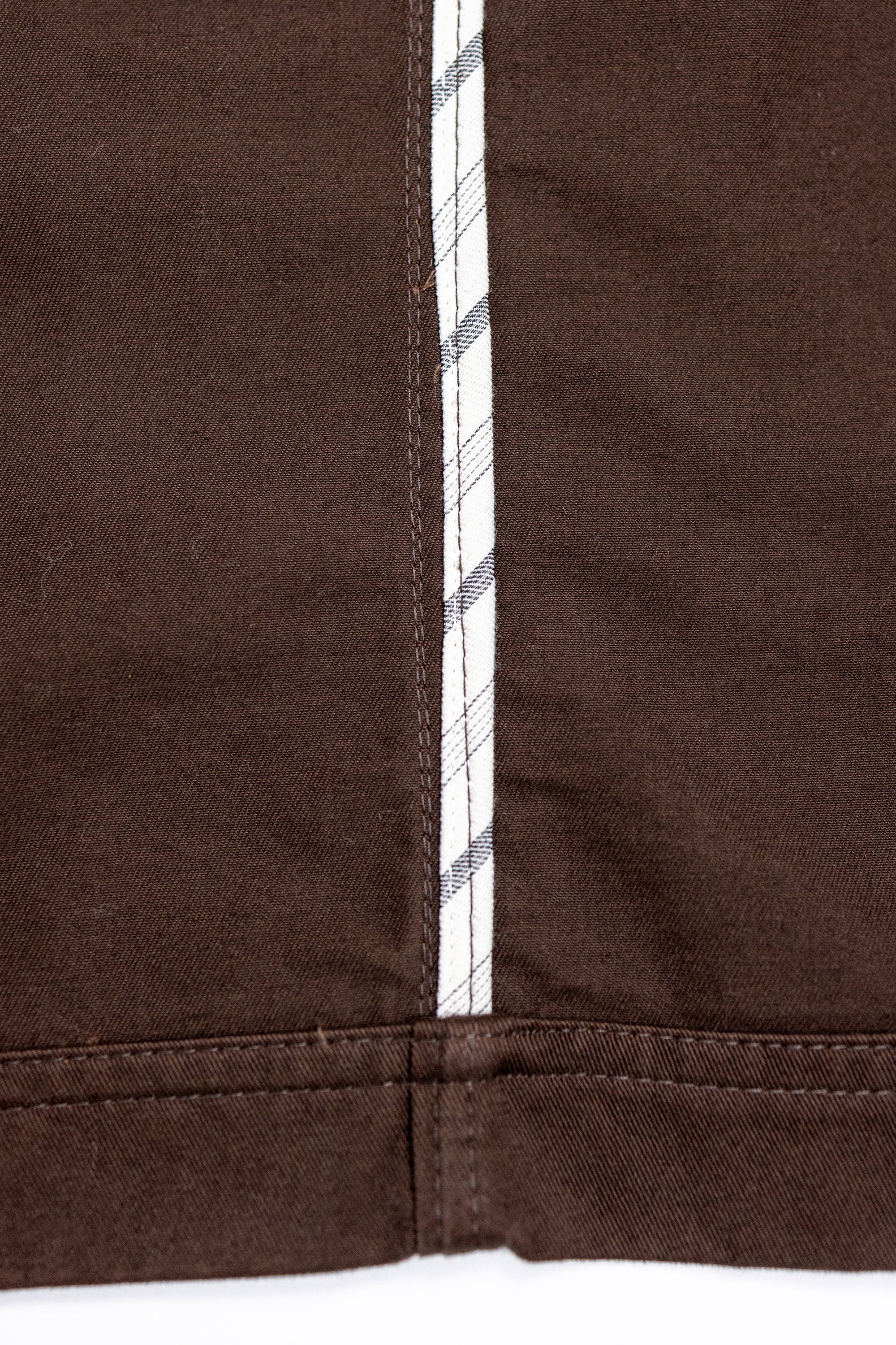 Hansen Garments Bendik Workwear Jacket - Chestnut - product shot - close up detail of inner jacket brand tag.