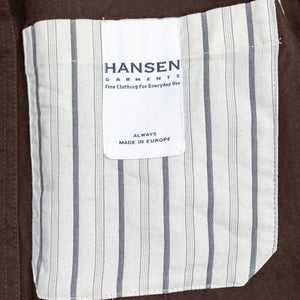 Hansen Garments Bendik Workwear Jacket - Chestnut - product shot - front facing - close up detail of inner jacket brand tag.