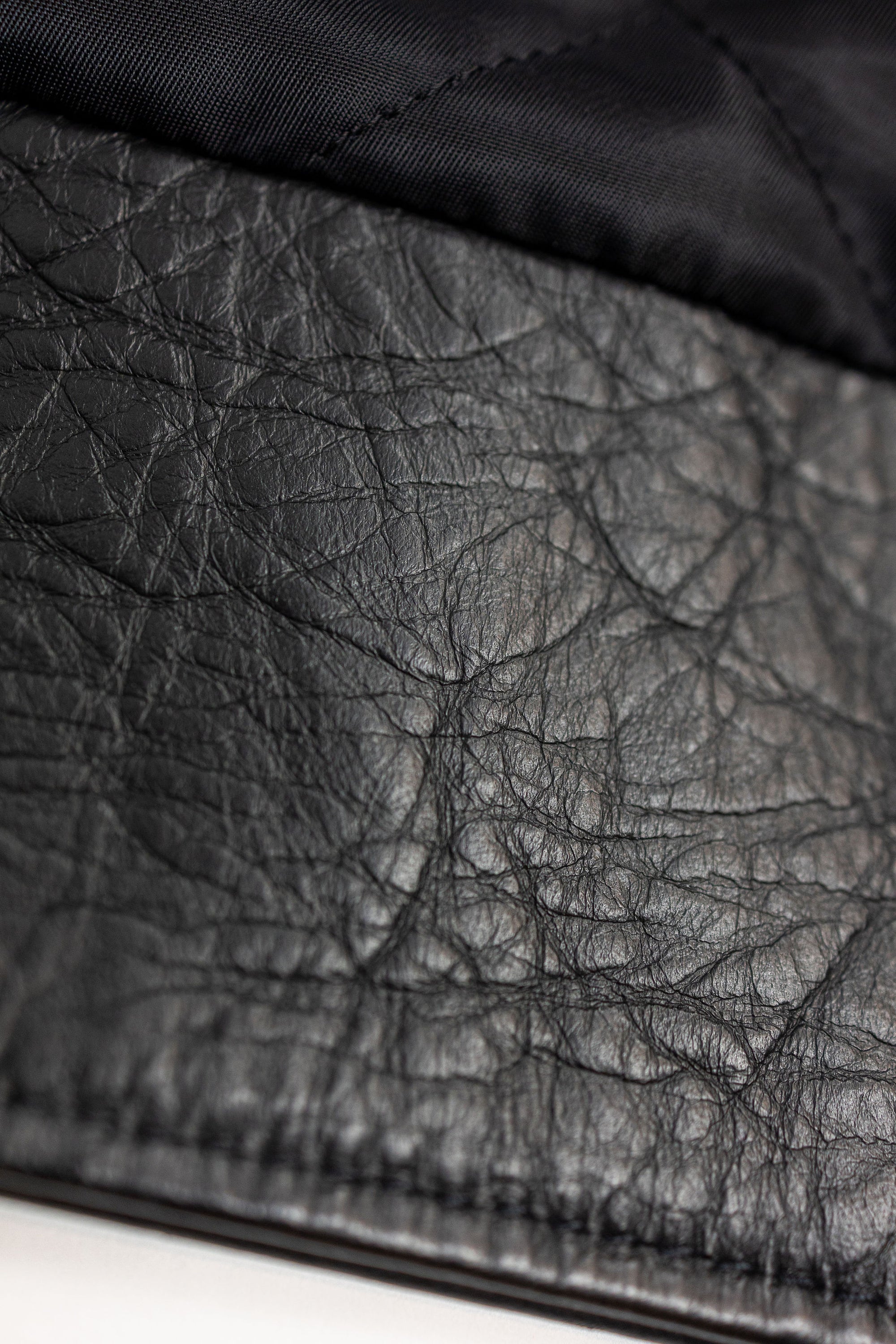Y'2 Sumi Dyed Leather Jacket- detail of leather grain
